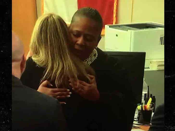 Judge Tammy Kemp hugging Amber Guyger