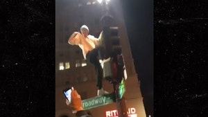 Warriors Fans Dance on Light Poles, In the Streets to Celebrate NBA Title