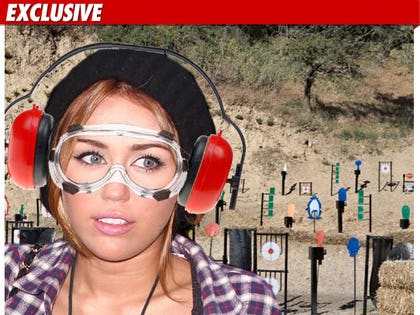 1119_miley_cyrus_gun_range_EX_tmz
