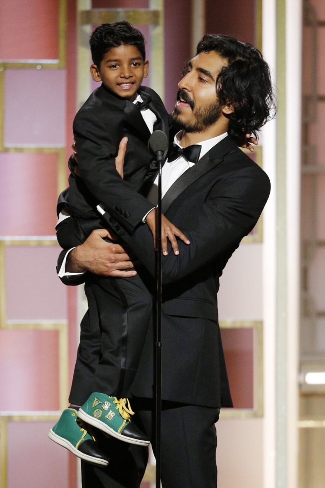 2017 -- Sunny Pawar and Dev Patel wear matching suits to introduce their nominated film for best drama, 