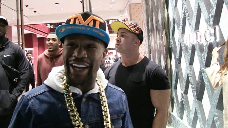 50 Cent Roasts Mayweather Over Gucci Shopping Spree
