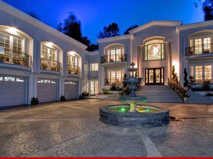 0311_manny_looking_house_MLS