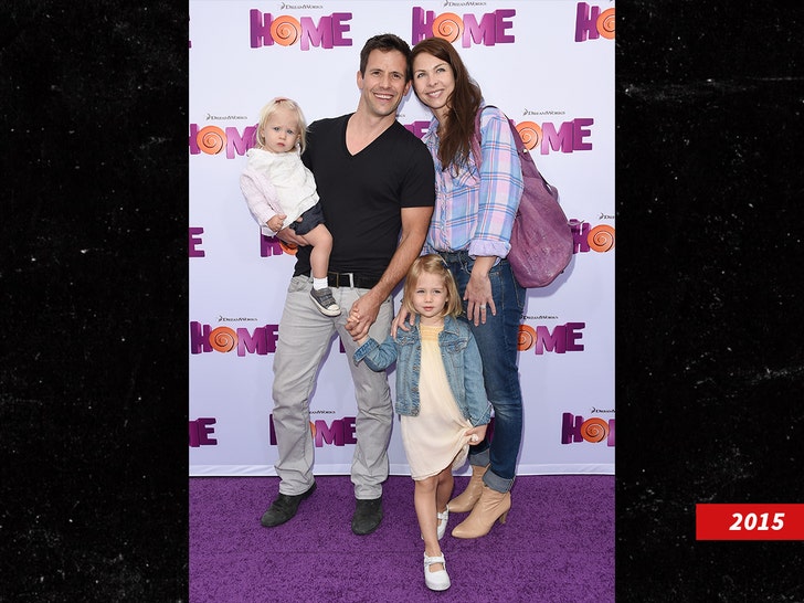 Christian Oliver and wife Jessica Mazur and children