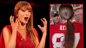 taylor swift and fan in kelce jersey getty 1