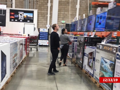 0102-mark zuckerberg at costco-date-swipe-swns
