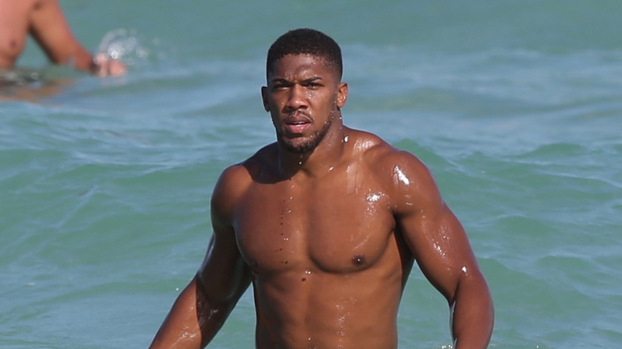 Boxer Anthony Joshua -- Hitting The Beach ... HARD