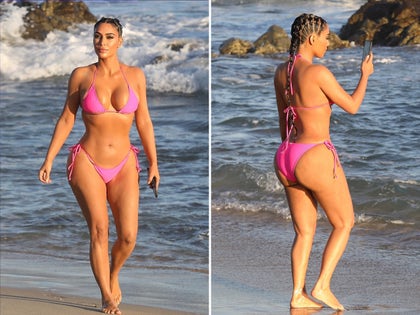 0824-kim-kardashian-pink-bikini-photos-mexico-primary-5