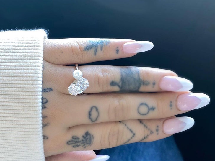 1220 ariana grande engagement instagram 01