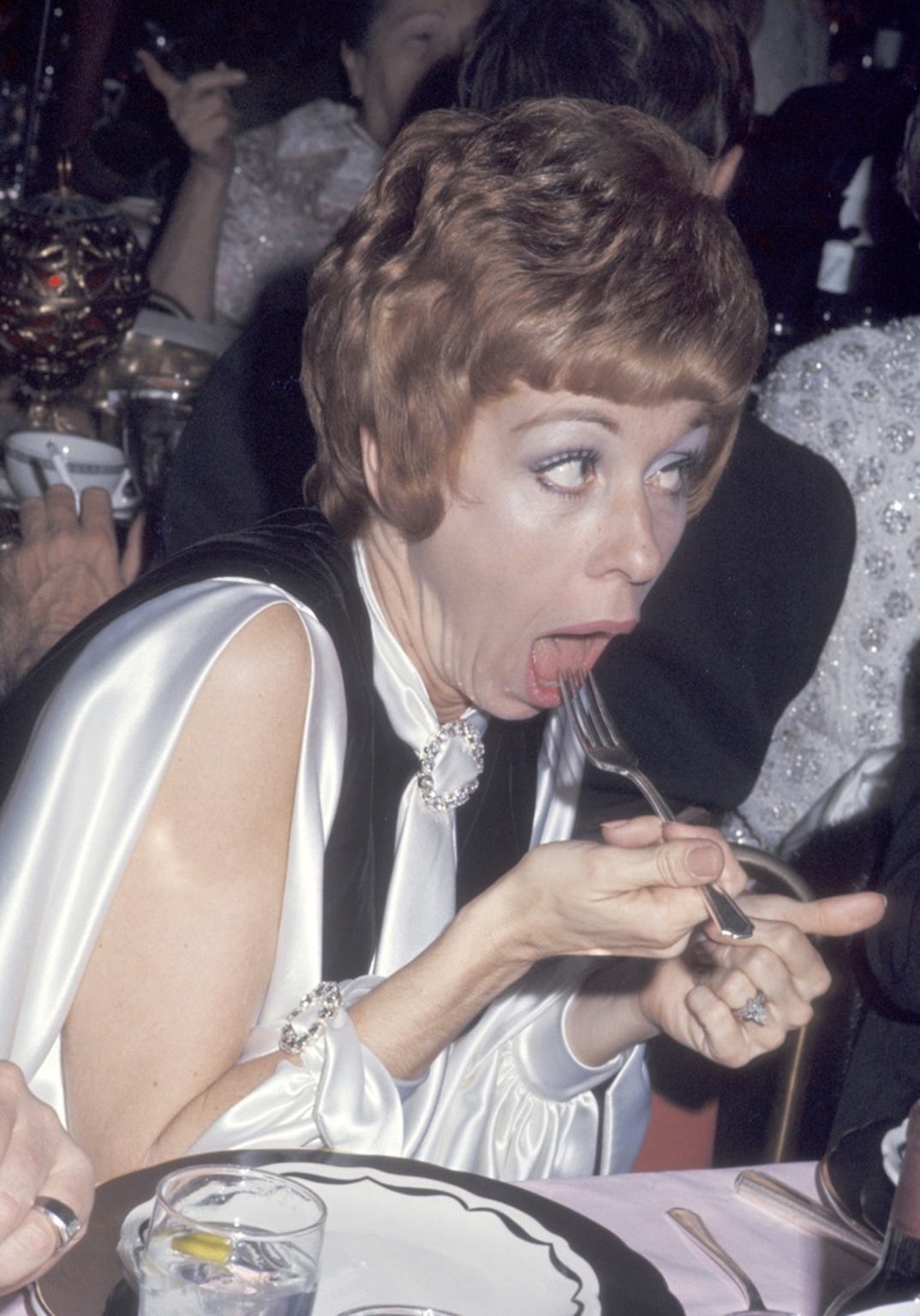 1970 -- Carol Burnett who's known for her Tarzan yell -- showed her humor as she enjoyed the food at the 27th Golden Globes.