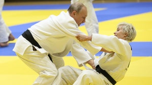 Vladimir Putin Hits the Judo Mats with Russian Olympic Babe