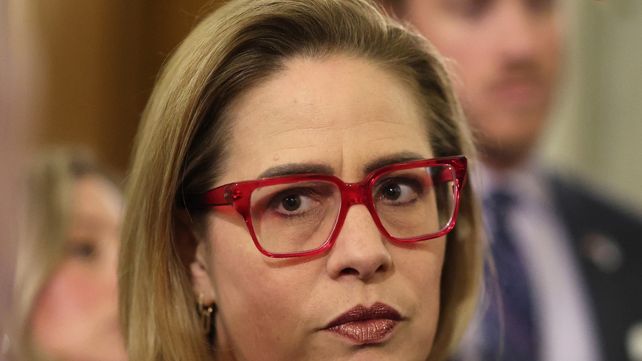 Kyrsten Sinema Set to Face Off With BF’s Ex-Wife After Losing Effort to Drop Adultery Lawsuit