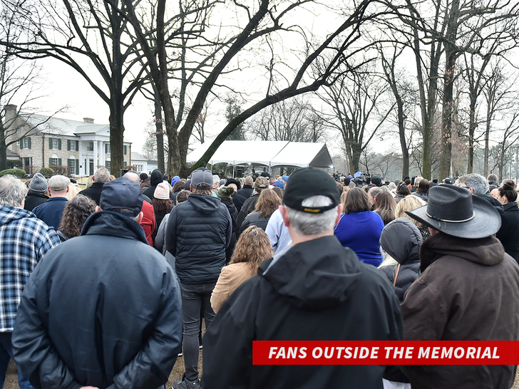Fans outside the memorial