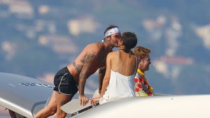 David & Victoria Beckham Enjoy Yacht Outing with Elton John