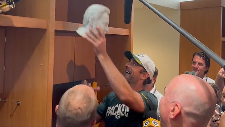 Aaron Rodgers Has Nicolas Cage Bust In Locker, Shows It Off To Reporters