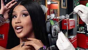 Cardi B Reveals Proof Of Her New Butt Crack Piercing