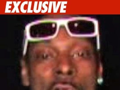 0424_snoop_ex_tmz_01-1