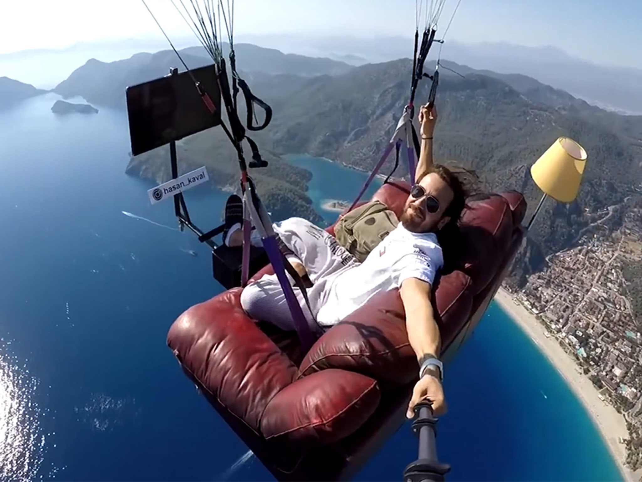 Turkish Man Becomes a Paragliding Couch Potato, TV & Sofa Included