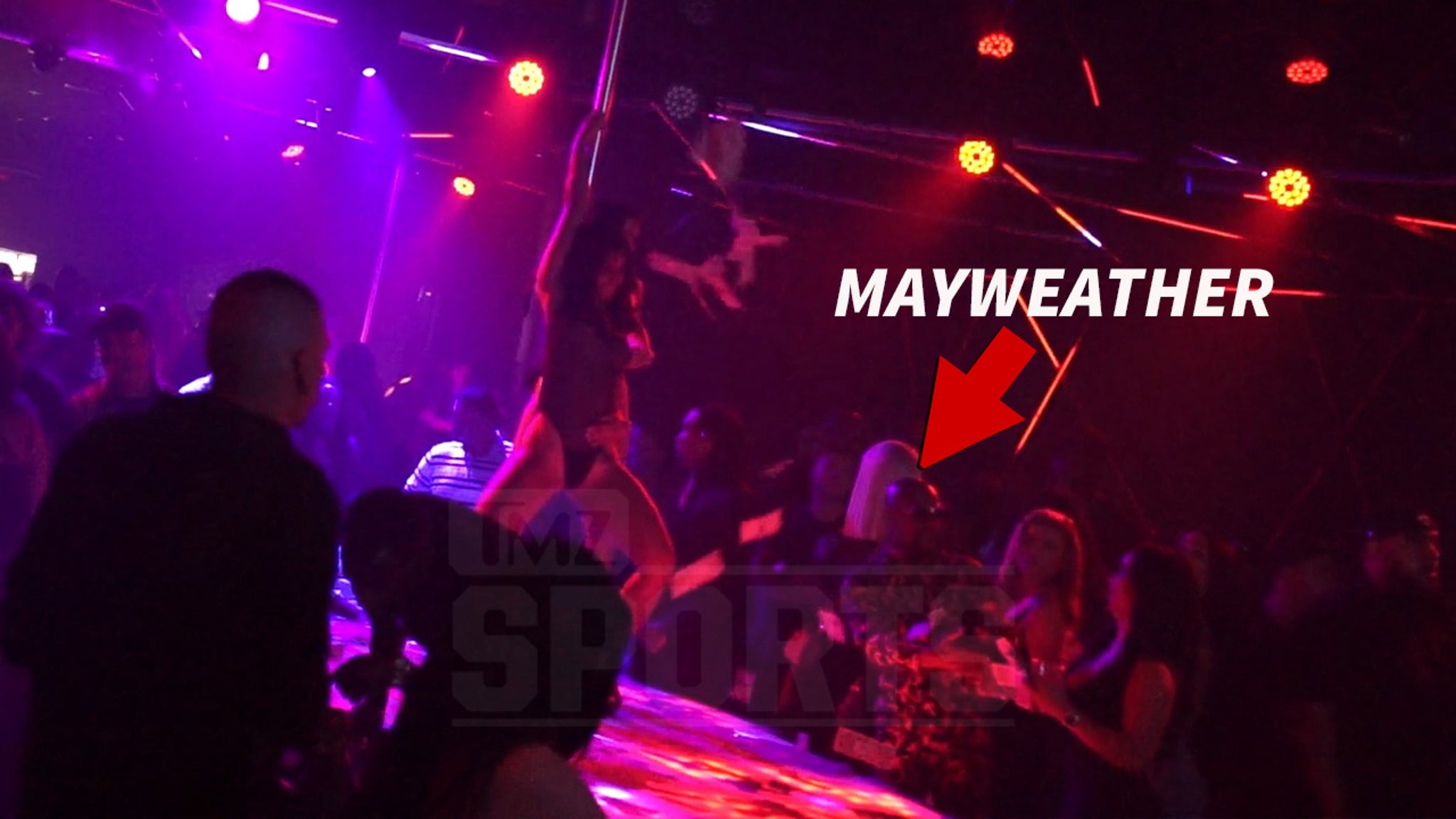 Floyd Mayweather Throws $50k From His Backpack at Strip Club.