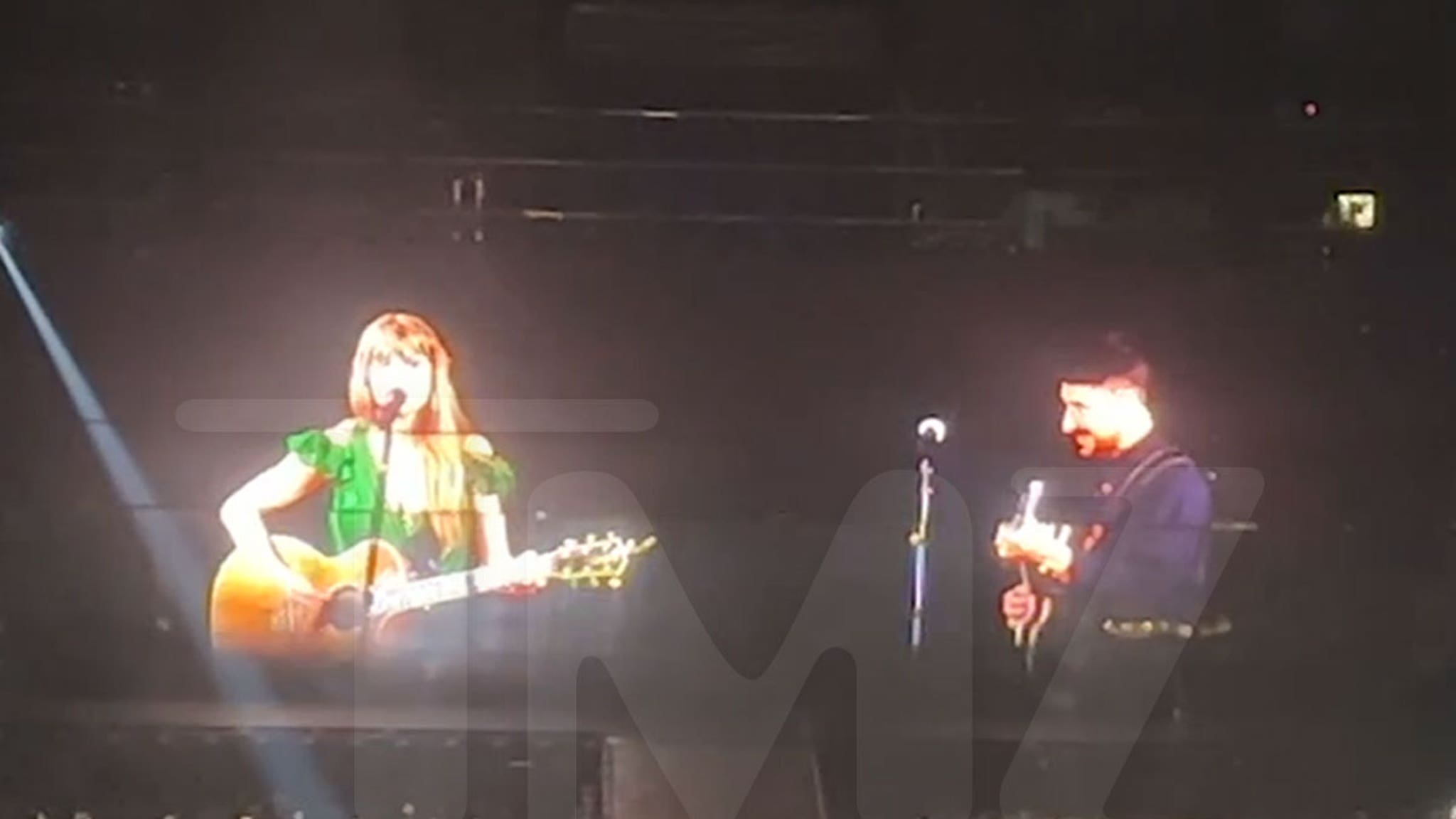 Taylor Swift and Marcus Mumford perform at the Las Vegas Eras Concert.
