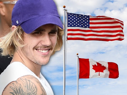 0914-justin-bieber-american-canadian-flag-getty-01