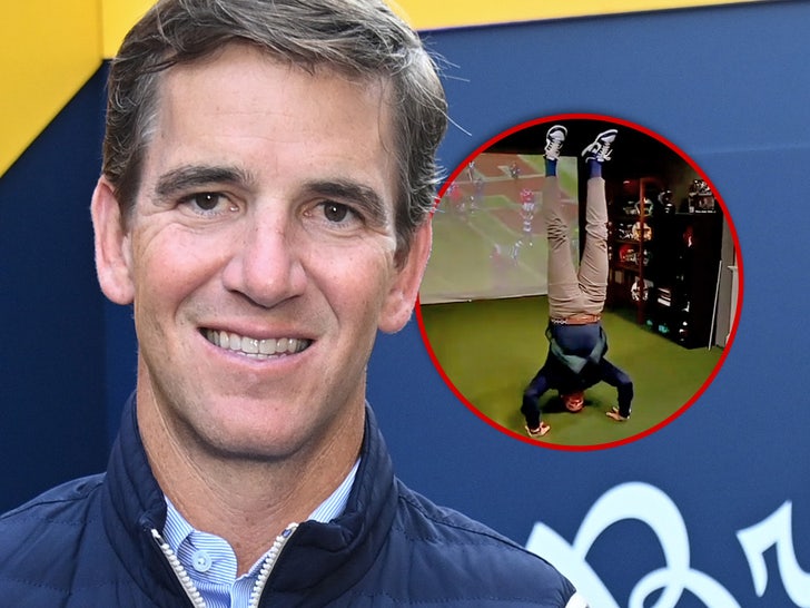 eli manning handstand