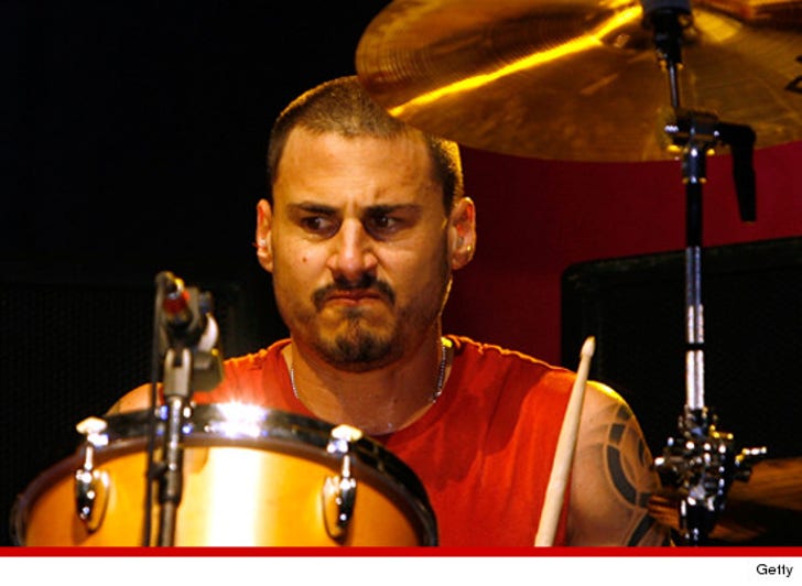 Rage Against the Machine -- Bummer for the Drummer Wife :: 0614-brad-wilk-getty-3