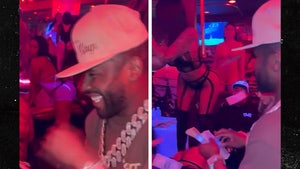 Floyd Mayweather Flaunts Stacks Of Cash At Strip Club