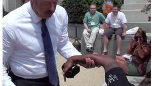 Dr. Phil to the Rescue -- After Photog Takes a SPILL
