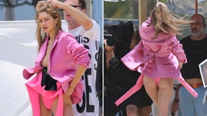 Gigi Hadid Goes Braless in Super Revealing Hot Pink Blazer