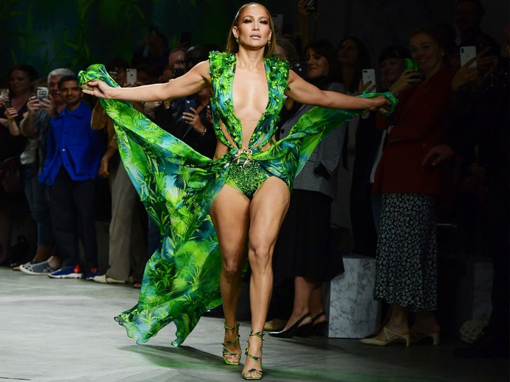 Jennifer lopez Brings Back Iconic Dress For Versace Fashion Show