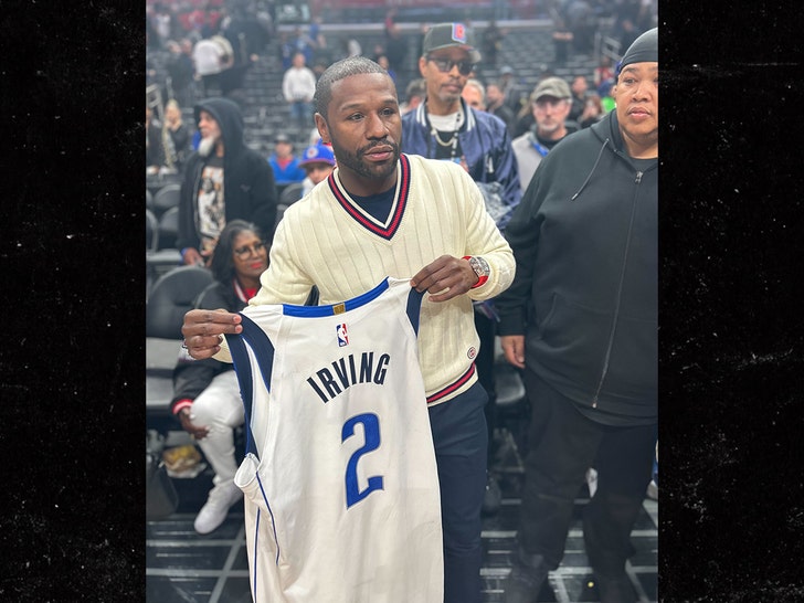 Kyrie Irving Gifts Mavericks Debut Jersey To Floyd Mayweather