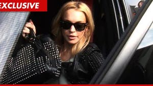 Lindsay Lohan Sued by Paparazzo Over Car Accident