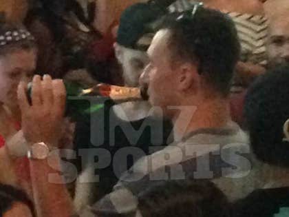 0619-johnny-manziel-champagne-01