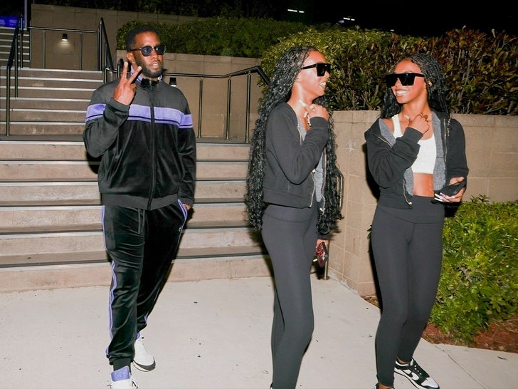 Diddy with twin daughters