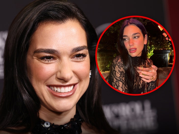 Dua Lipa Sparks Engagement Rumors By Showing Off Massive Gold Ring