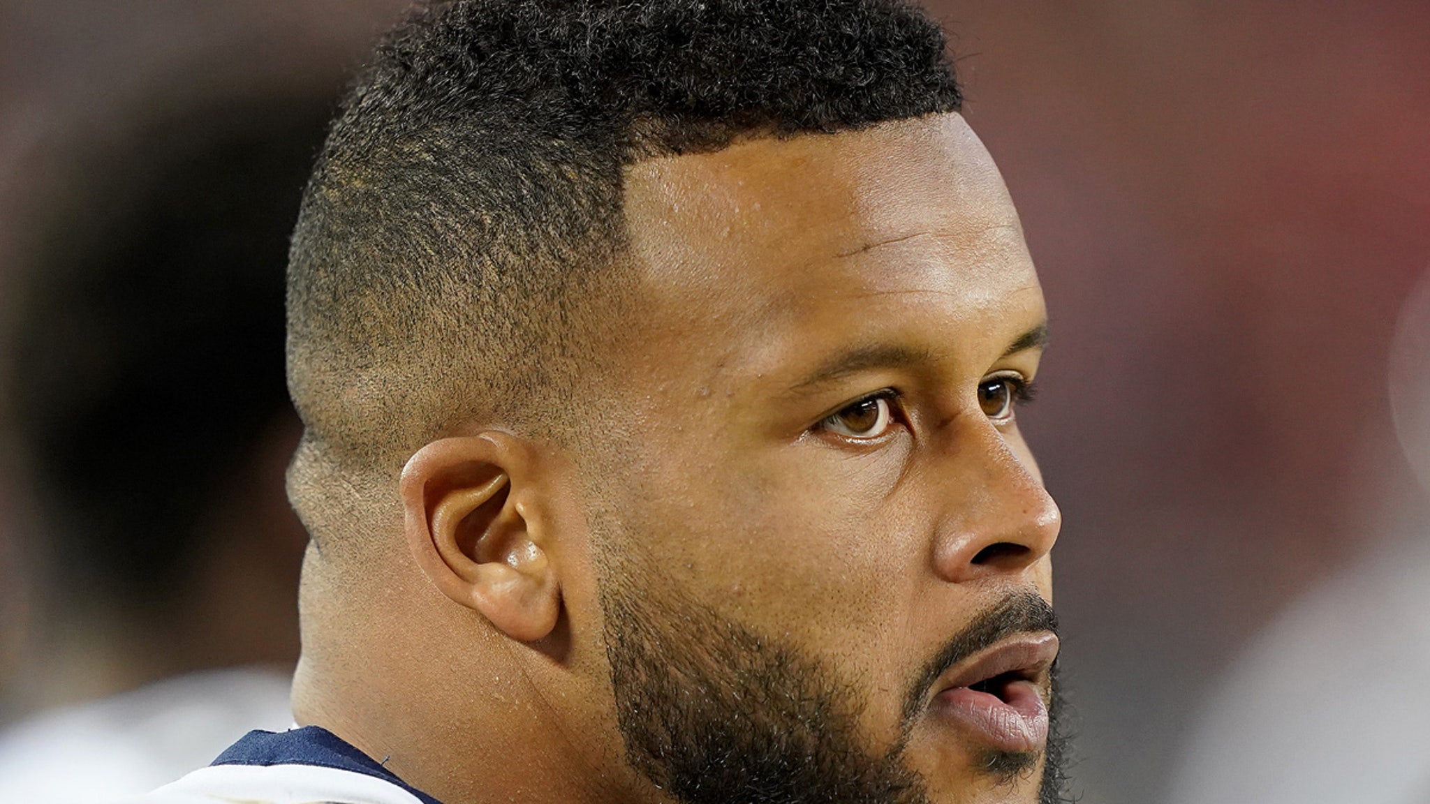 Aaron Donald’s surveillance video shows the NFL star attacked with a bottle, lawyers claim