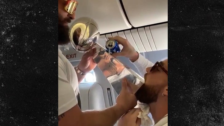 Chiefs' Travis Kelce used the Lombardi Trophy as a beer luge after winning Super  Bowl LIV 