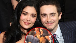 Just mere moments after Timothée won the Critics' Choice Award for Best Actor, he smooched his bae, Kylie Jenner, and proceeded to use her perky posterior to stand up and gain momentum before heading towards the stage. If y'all were skeptical of this duo before, this PDA moment has gotta change your minds, right?!