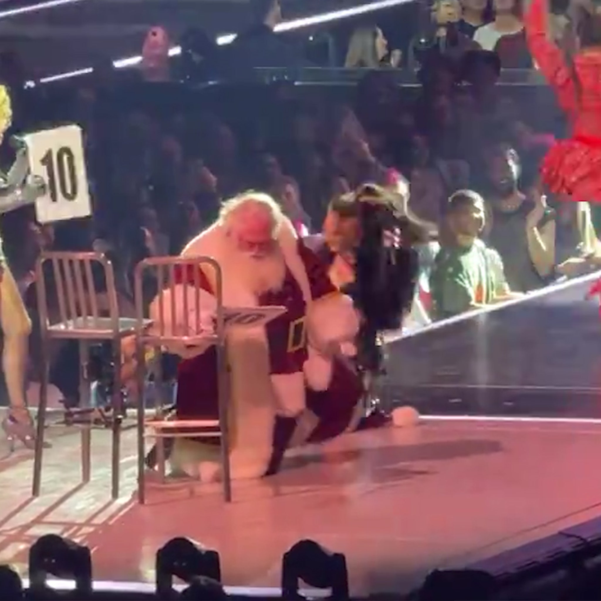 Santa Gets Lap Dance at Madonna Show, Falls Off Chair