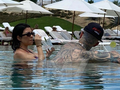 travis barker and kourtney kardashian on vacation