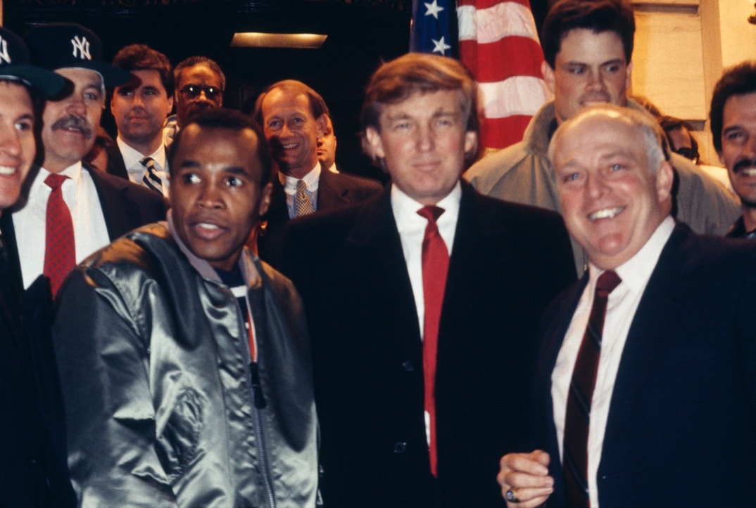 Donald Trump at an event in New York City. With him are boxer Sugar Ray Leonard and New York Yankees manager Stump Merrill.
