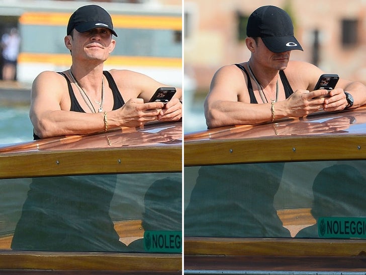 Orlando Bloom Enjoys Solo Sailing On Water Taxi In Venice