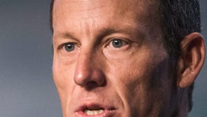 Lance Armstrong -- Booted from Nike, Steps Down from Livestrong
