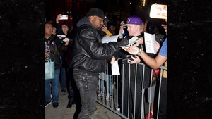 Kanye West Swarmed by Fans at Lakers Game as He Pleads for Kim's Return