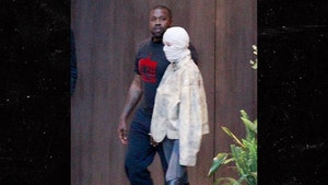 Kanye West Steps Out with Wife Bianca Censori with Her Head Fully Wrapped
