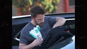 Ben Affleck Pulls Out Carton of Cigarettes While Picking Up Kids