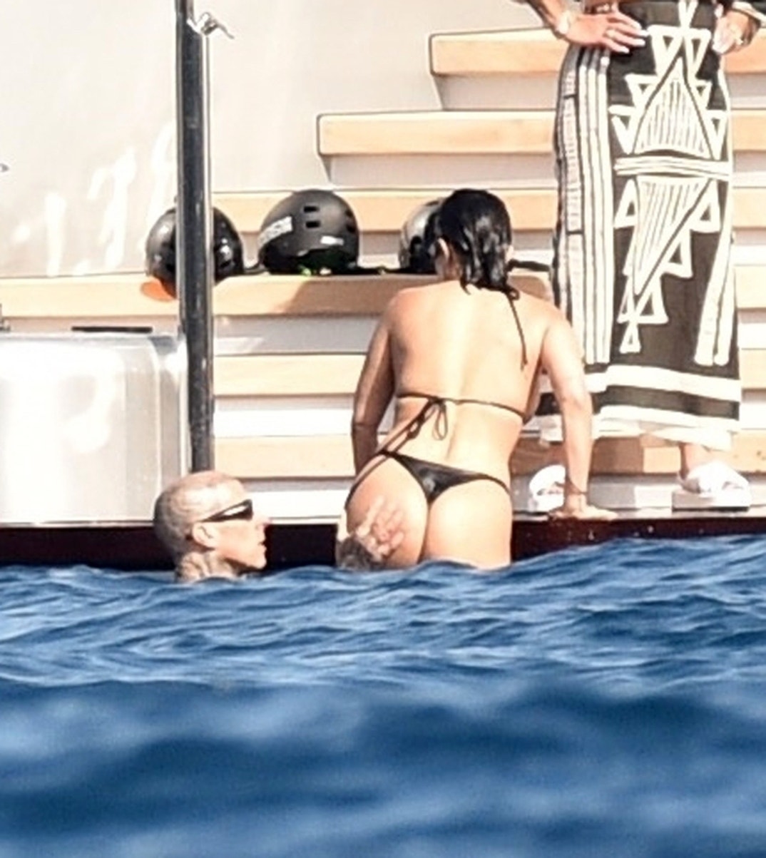 Kourtney Kardashian and Travis Barker Party on Yacht Ahead of Wedding