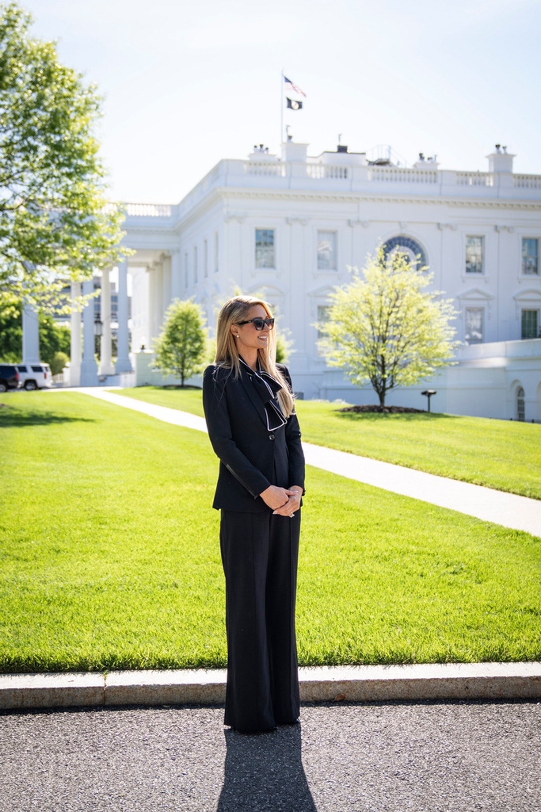 Actress and model Paris Hilton stands outside the White House on May 10, 2022 in Washington, DC. Hilton and her husband Carter Reum visited the White House to meet with Biden administration officials regarding child abuse laws.
