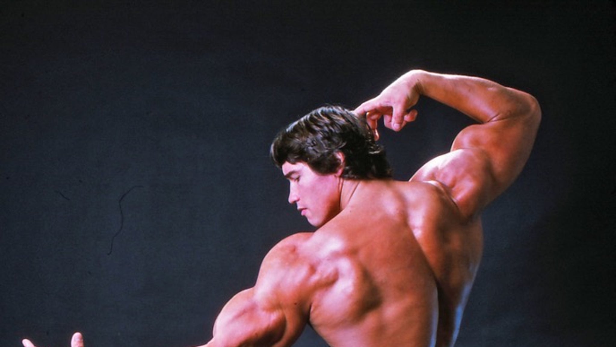 Arnold Schwarzenegger's Flexing Photos