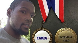 Kevin Durant -- Receiving Hero Award ... 'For Courageously Helping Paramedics'